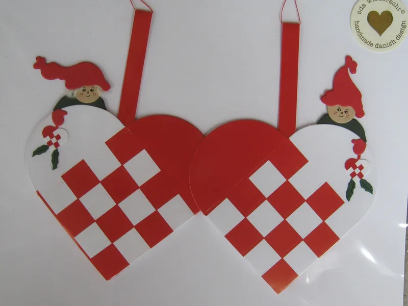 2 red/white hearts w/nissar paper cuts 5" x3" Made in Denmark by Oda Wiedbrecht  1 left