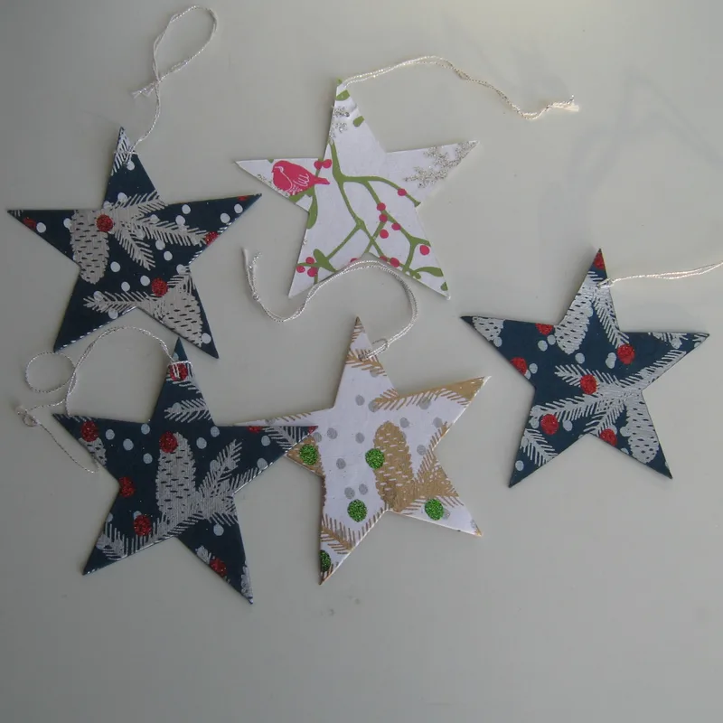 Flat paper stars (5)   Pluto of Sweden  4" x 4"  printed on both sides