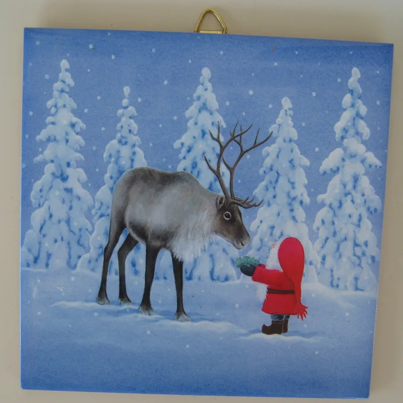 Christmas ceramic tile w/hook "Tomte feeding reindeer" 6" x 6" cork backing