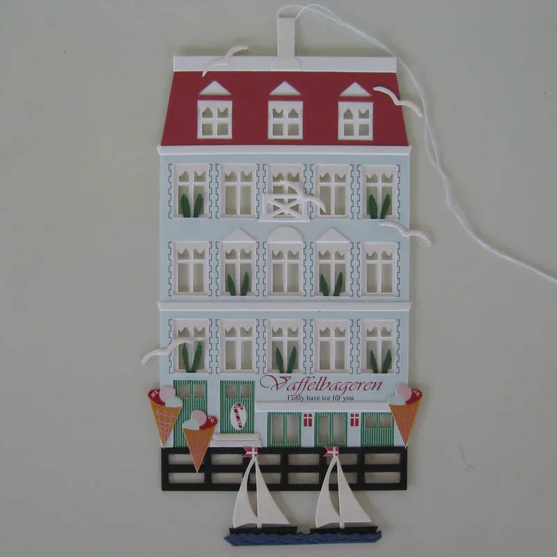Papercut mobile "Vaffelbagaren" by Oda Wiedbrecht, 6.5" x 6.5"  5 left