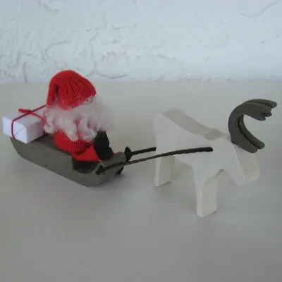 Tomte on sled with reindeer 7.5" long 3" tall Made in Sweden