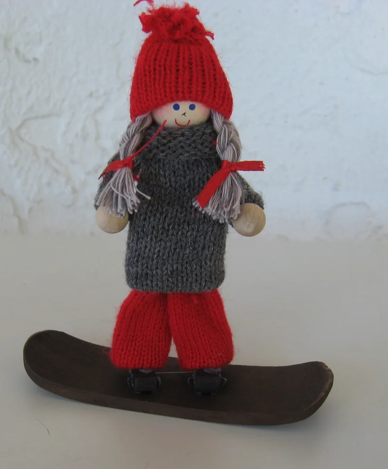 Tomte girl on snowboard  4" tall  Made in Sweden