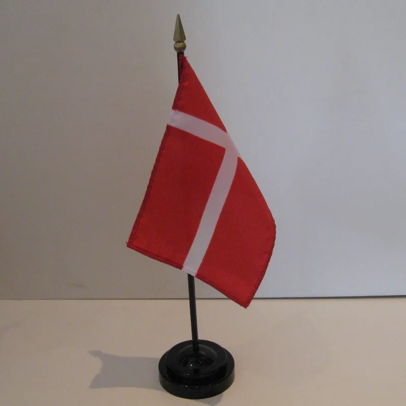 A Danish Table Flag in plastic holder, 10" tall
