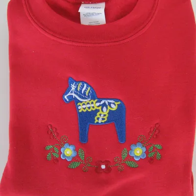 Sweatshirt, red, with embroidered blue Dalahorse, size: Small One left