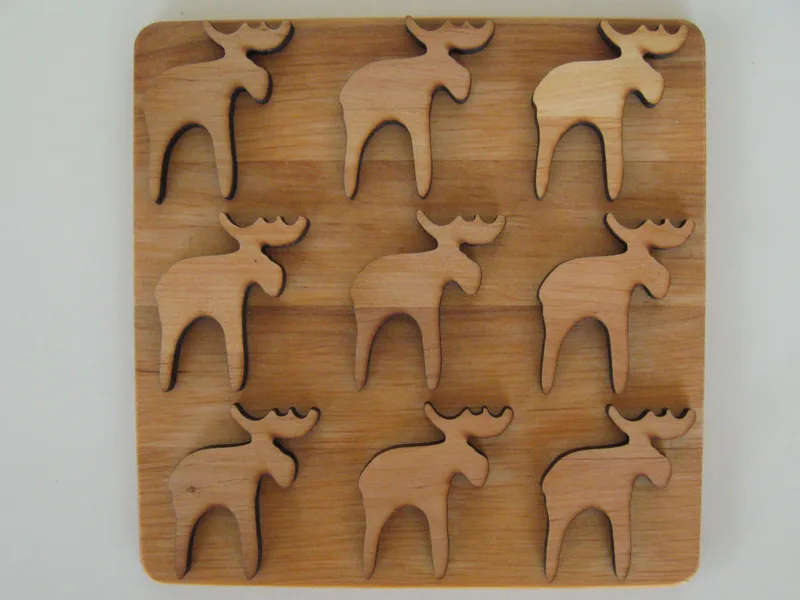 alder trivet with moose design 6.5" x 6'5" Made in Sweden