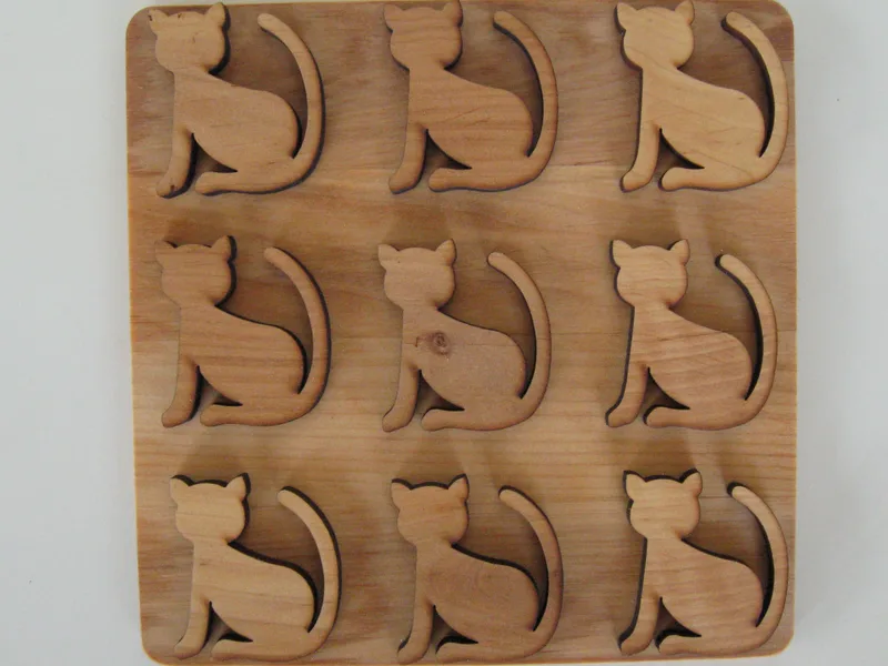 alder trivet with cat design 6.5" x 6'5" Made in Sweden