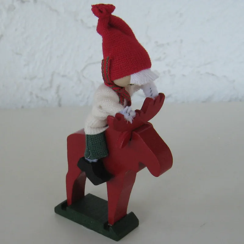 Tomte on red moose  4" tall  Made in Sweden