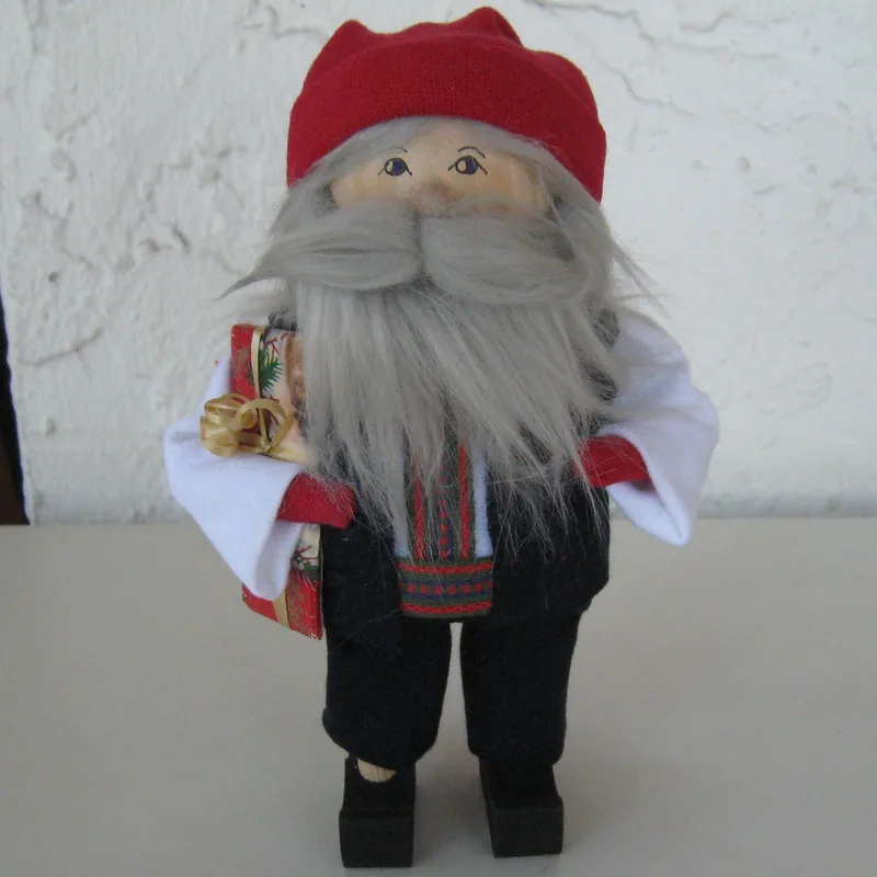 Blue and Red tomte with present, 8" tall, Butticki of Sweden